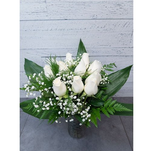 Arrangement composé de douze roses