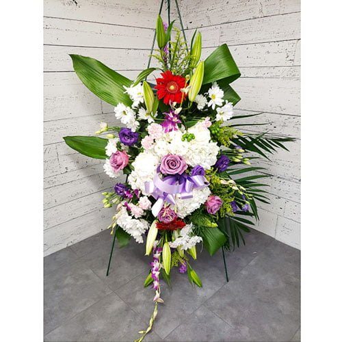 Arrangement made of white and purple flowers - Actuel Services Funéraire